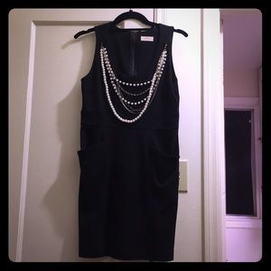Black dress with attached pearl necklace